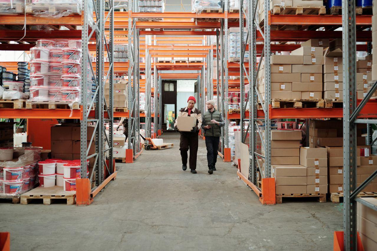 Warehouse workers managing temporary import inventory in a facility subject to Annex 24 compliance in Mexico