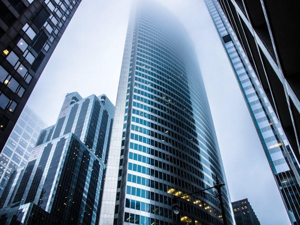 Modern corporate buildings representing treasury management and financial operations for companies doing business in Mexico.