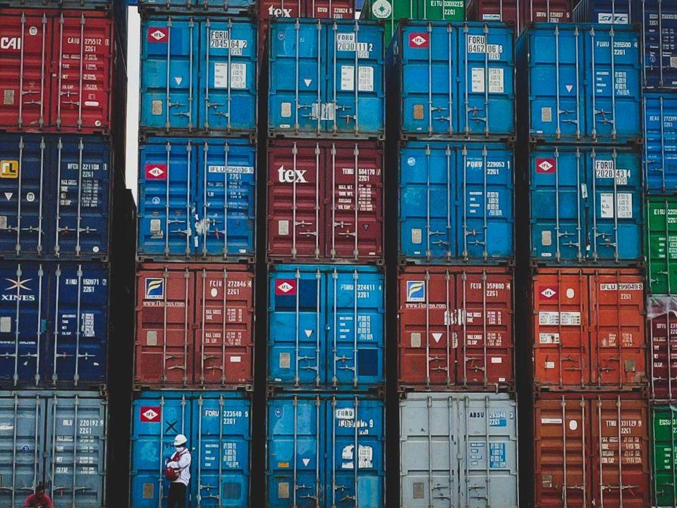 Stacked shipping containers used for international cargo transport and import operations in Mexico