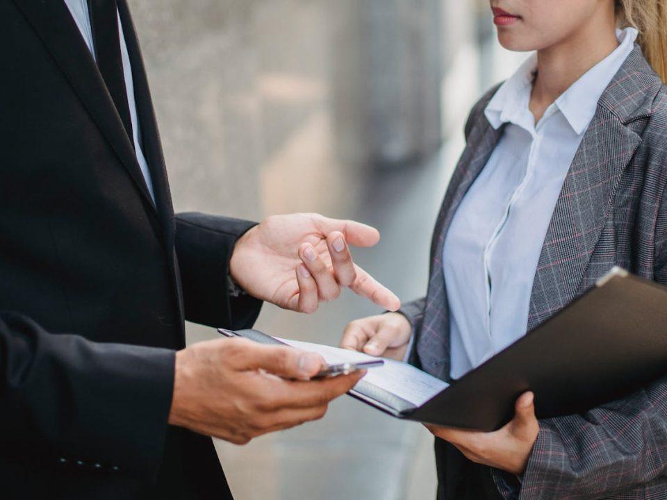 Business professionals discussing REPSE compliance requirements and documentation in Mexico