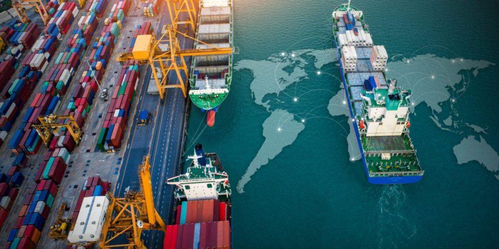 Container ships at an international seaport supporting global trade and supply chains for manufacturers using the shelter model in Mexico.