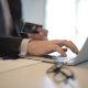 Business professional accessing an online banking platform, representing secure bank account administration in Mexico