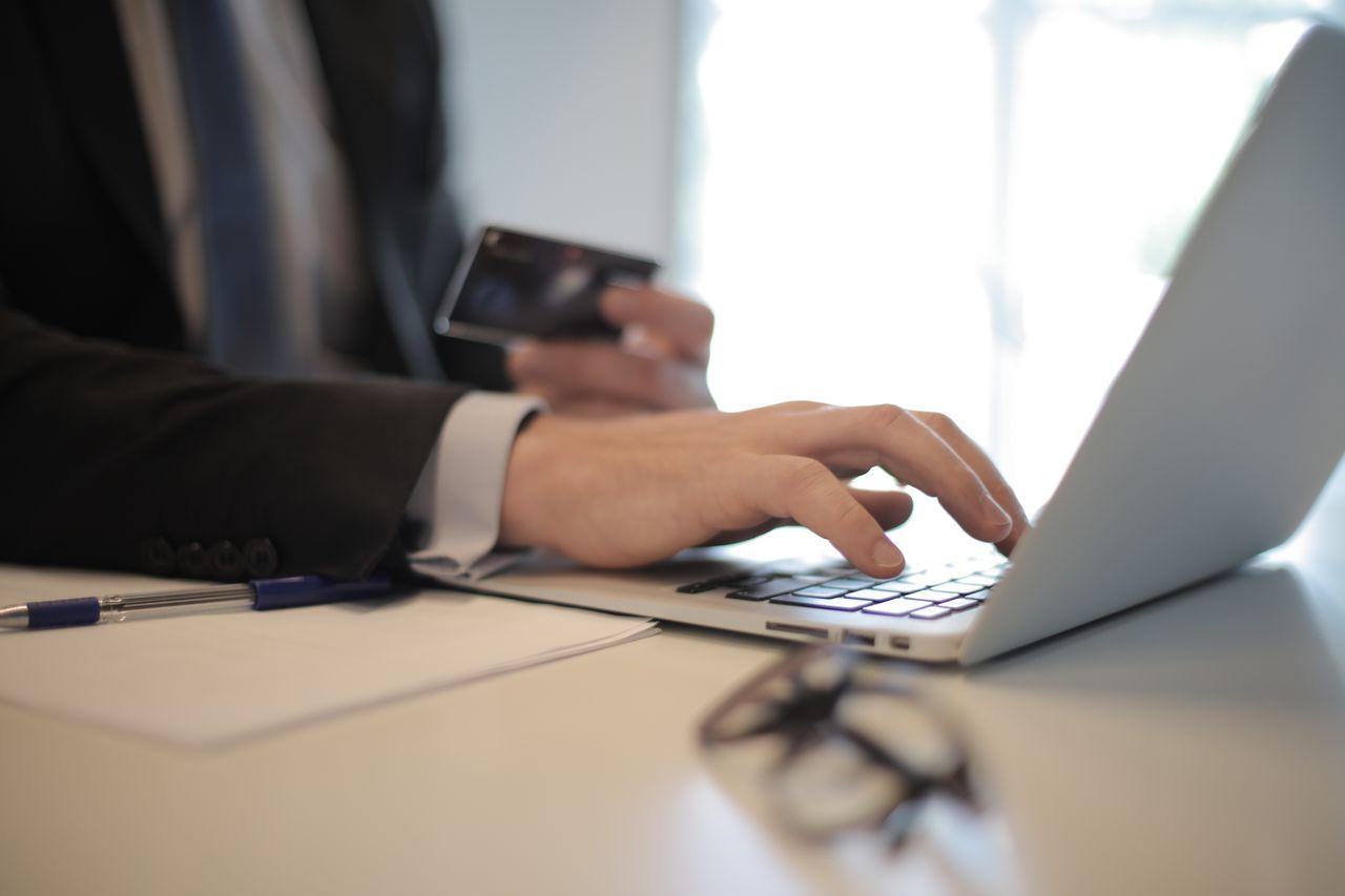 Business professional accessing an online banking platform, representing secure bank account administration in Mexico